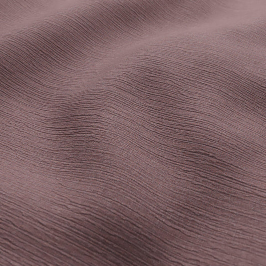 Sekers Glamis Mauve fire retardant curtain fabric draped