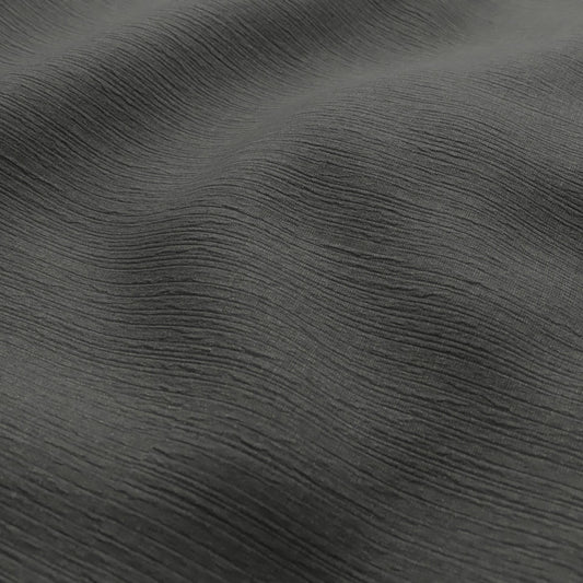 Sekers Glamis Shale fire retardant curtain fabric draped