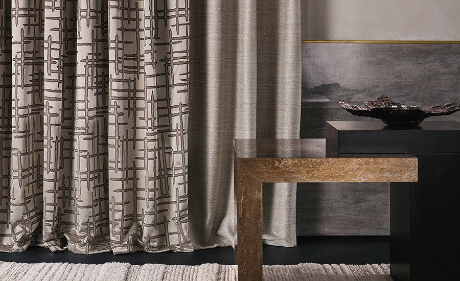 Zinc Textile Jet Set fire retardant curtain fabric in a styled interior
