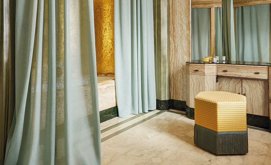 Kirkby Design Ornate Drapery FR fire retardant curtain fabric in a styled interior