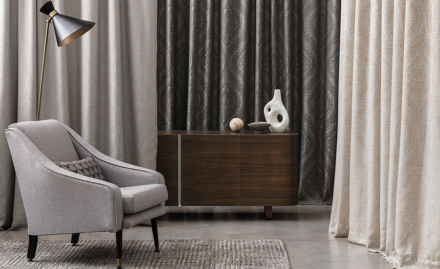 Romo Sesia fire retardant curtain fabric in a styled interior