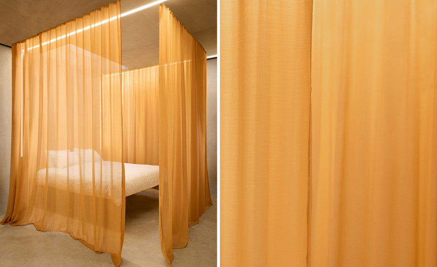 Kirkby Design Vision FR fire retardant curtain fabric in a styled interior
