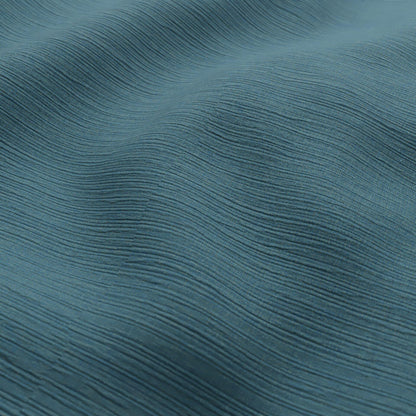 Sekers Glamis Azure fire retardant curtain fabric draped