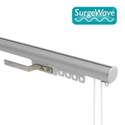 Motiva Round Corded curtain track in silver dressed with wave curtains