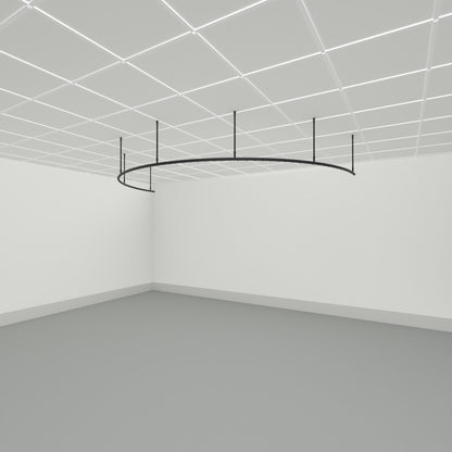 Zone C half circle dividing curtain track suspended from a grid ceiling on drop tubes