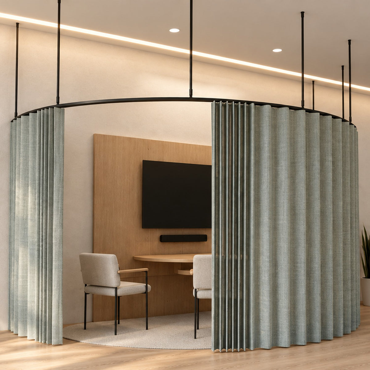 Zone C half circle dividing curtain track with a wave curtain, suspended on drop tubes as a half-circle huddle pod against a wall