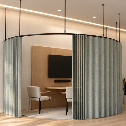Zone C half circle dividing curtain track with a wave curtain, suspended on drop tubes as a half-circle huddle pod against a wall