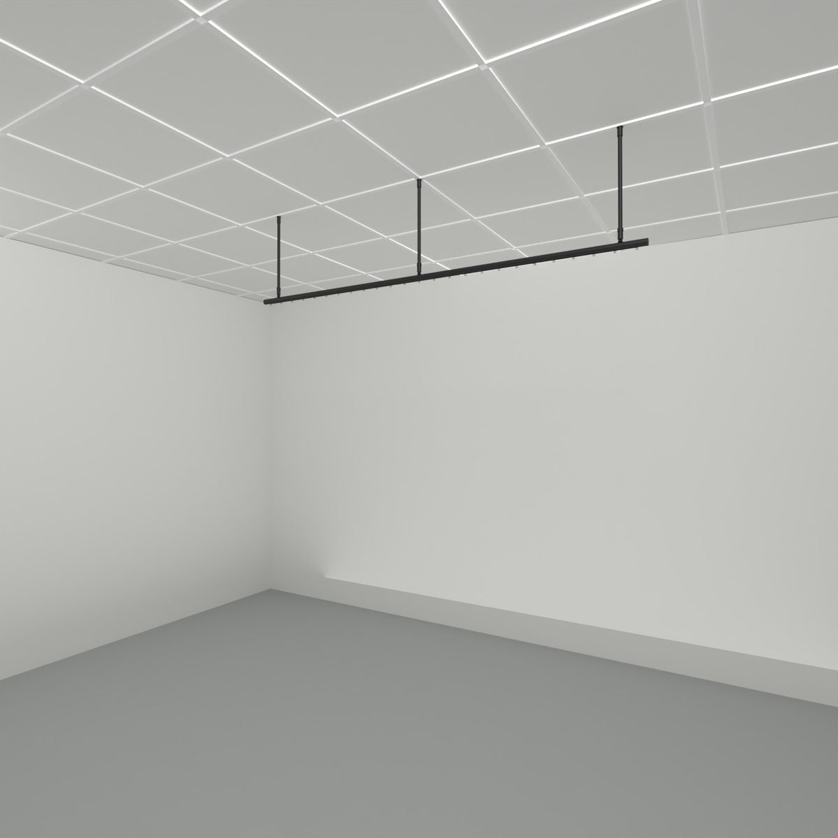 Zone I straight run dividing curtain track suspended from a grid ceiling on drop tubes