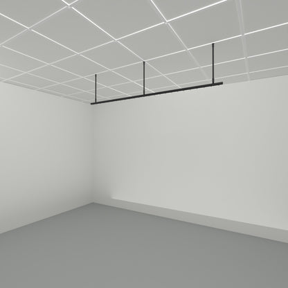 Zone I straight run dividing curtain track suspended from a grid ceiling on drop tubes