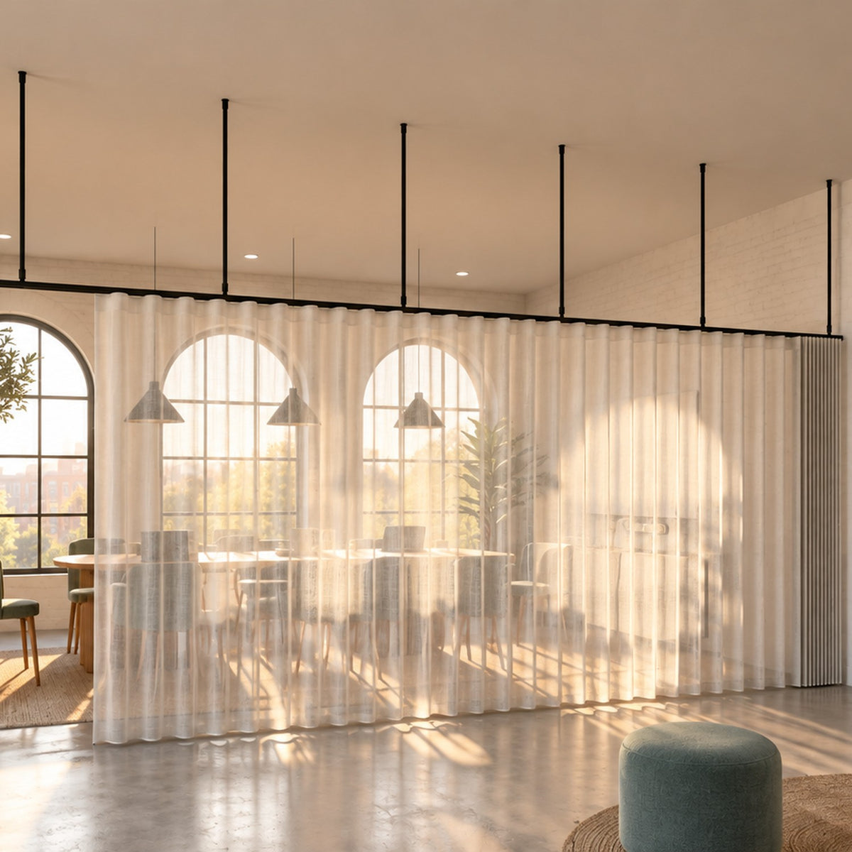 Zone I straight run dividing curtain track with a wave curtain, suspended on drop tubes dividing a meeting room from an open-plan office