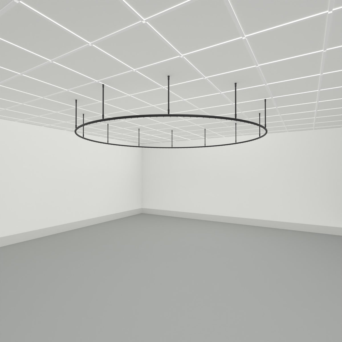 Zone O full circle dividing curtain track suspended from a grid ceiling on drop tubes