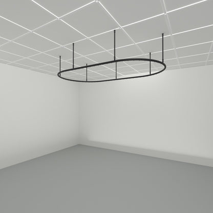 Zone Pod dividing curtain track suspended from a grid ceiling on drop tubes