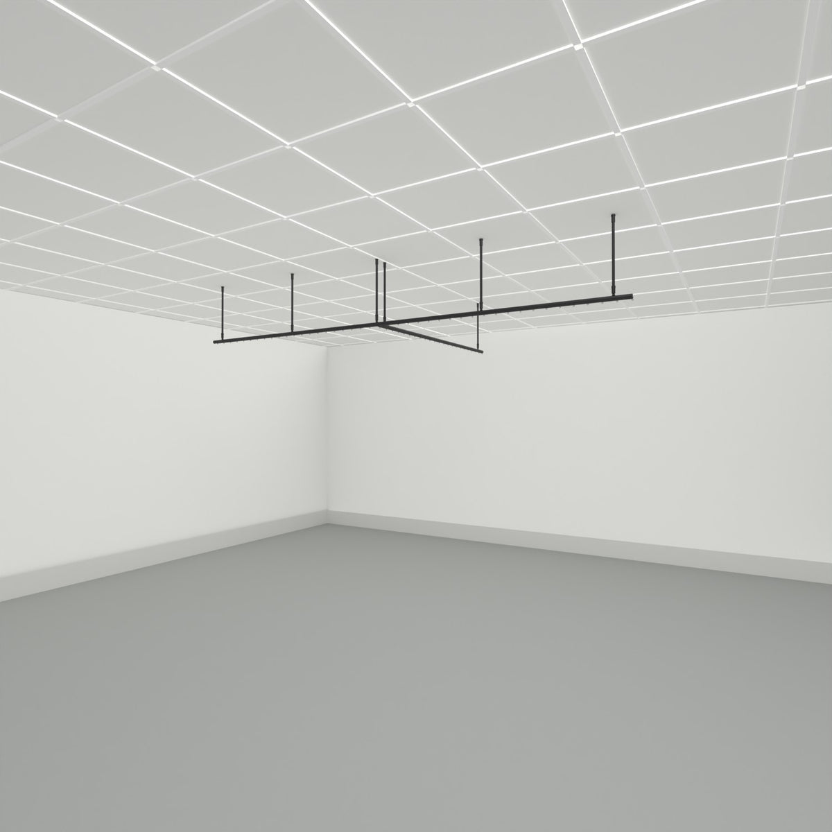 Zone T dividing curtain track suspended from a grid ceiling on drop tubes