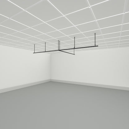 Zone T dividing curtain track suspended from a grid ceiling on drop tubes