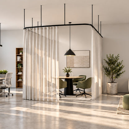 Zone U dividing curtain track with a wave curtain, suspended on drop tubes as a three-sided meeting booth